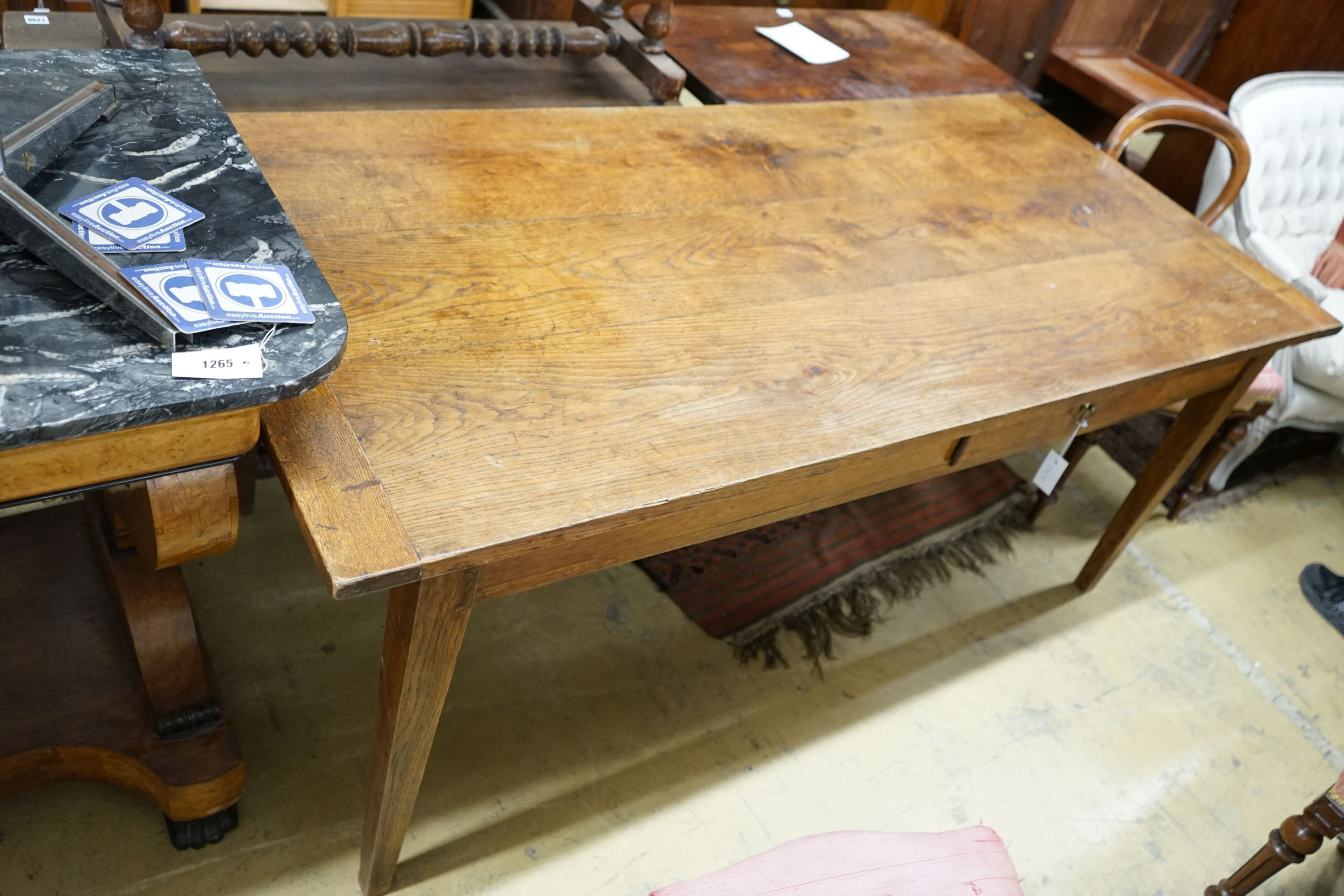 A 19th century French rectangular oak kitchen table, length 183cm, depth 87cm, height 75cm